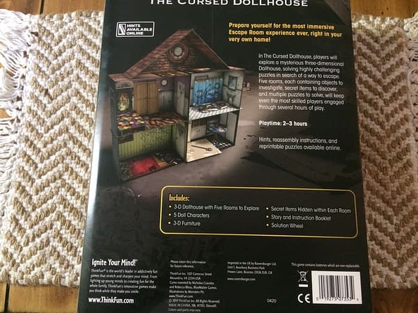 The rear of the box for Escape The Room: The Cursed Dollhouse by ThinkFun Inc., out this Fall!