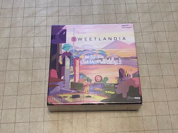 The front cover of the box for Sweetlandia, a candy-coated card game by UltraPro Entertainment and Stoneblade Entertainment.