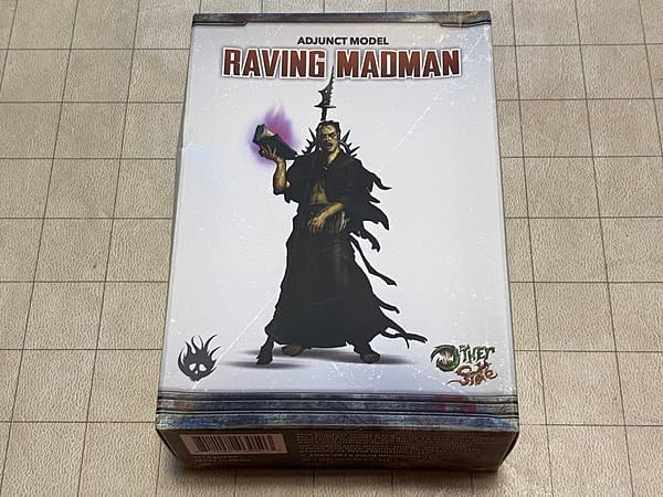 The front of the box for the Raving Madman, an adjunct model in Wyrd Miniatures' wargame The Other Side.