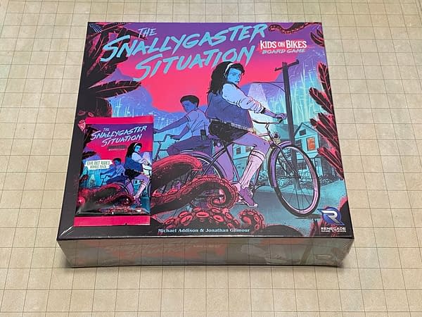 The front of the box for The Snallygaster Situation, a board game by Renegade Game Studios based on the Kids on Bikes RPG.