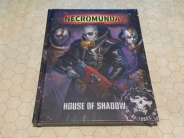 The front cover of House of Shadow, a source rulebook for rules pertaining to Necromunda's House Delaque. This source rulebook is also attributed to Games Workshop.