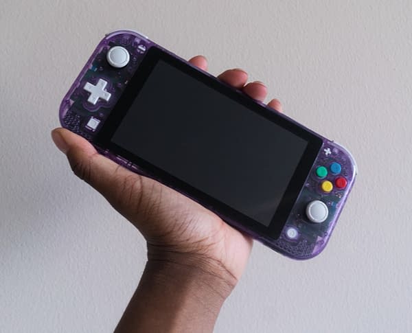 Like a throwback to 1998, a Nintendo Switch transformed into a Game Boy Color. Courtesy of @TyDilla.