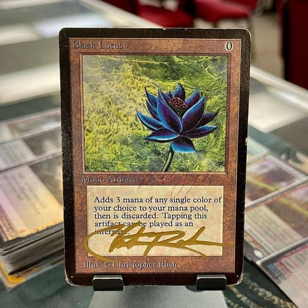 The Black Lotus in question, signed by both artist Christopher Rush and Magic: The Gathering creator Richard Garfield. Image attributed to Finch and Sparrow Games in Signal Hill, California.