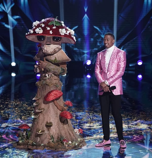 THE MASKED SINGER: L-R: Mushroom with host Nick Cannon in the 