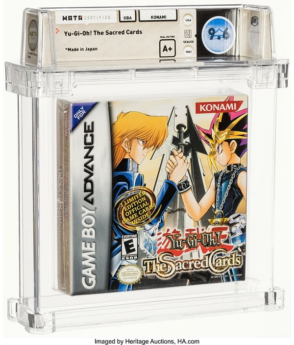 The front face of the graded, sealed box for Yu-Gi-Oh! The Sacred Cards, a video game for the Nintendo Game Boy Advance handheld system. Currently available at auction on Heritage Auctions' website.