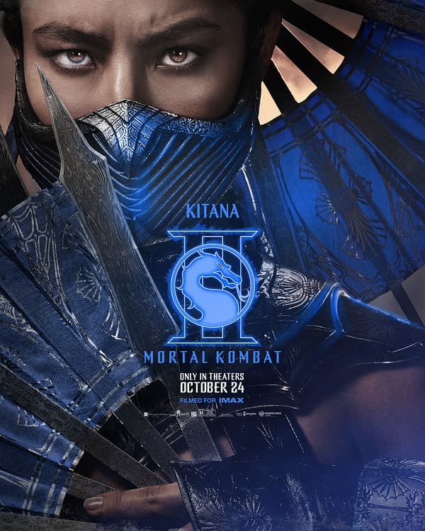 A promotional poster for 'Mortal Kombat II' featuring the character Kitana, who is wearing a blue outfit and holding a set of bladed fans. The background includes stylized patterns, and the poster displays the release date, emphasizing its theatrical debut.