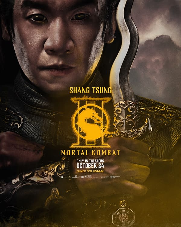 A dramatic movie poster for 'Mortal Kombat II,' featuring the character Shang Tsung with intense expression, holding a sword, and adorned in ornate armor. The poster includes release details stating it will be in theaters on October 24, filmed for IMAX.