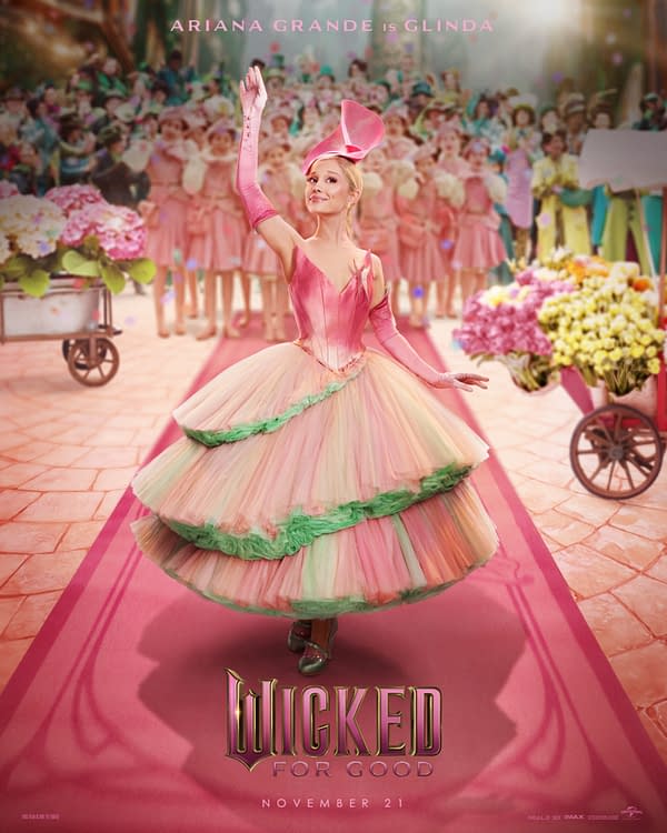 A colorful promotional poster for 'Wicked: For Good' features a character dressed as Glinda, played by Ariana Grande. She wears a large pink and pastel gown, waving to an audience with a joyful expression as a crowd dressed in pastel colors stands behind her.