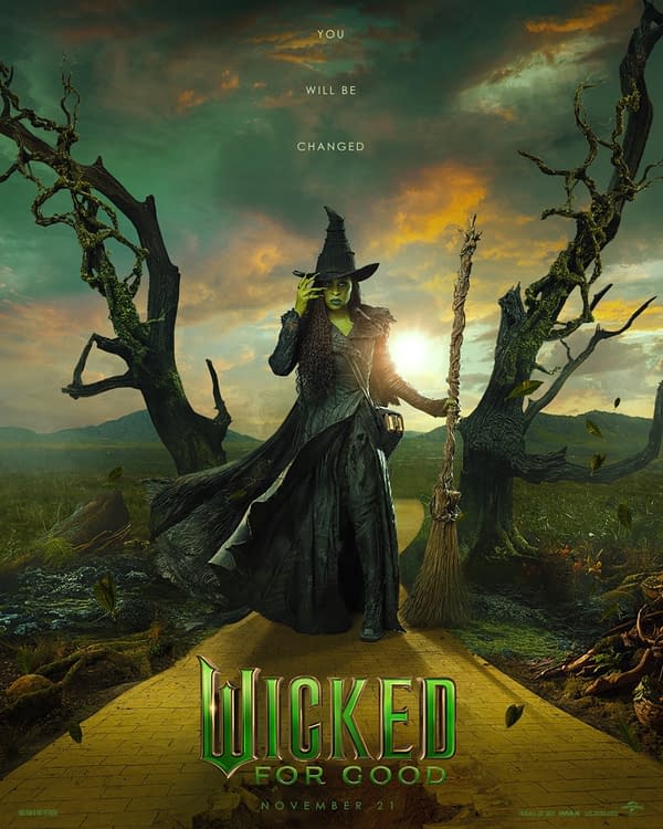 A promotional illustration for the musical "Wicked," featuring a green-skinned witch in a dramatic black outfit, holding a broom. The background shows a fantastical landscape with twisted trees and a sunset, and the text "Wicked For Good" prominently displayed at the bottom.
