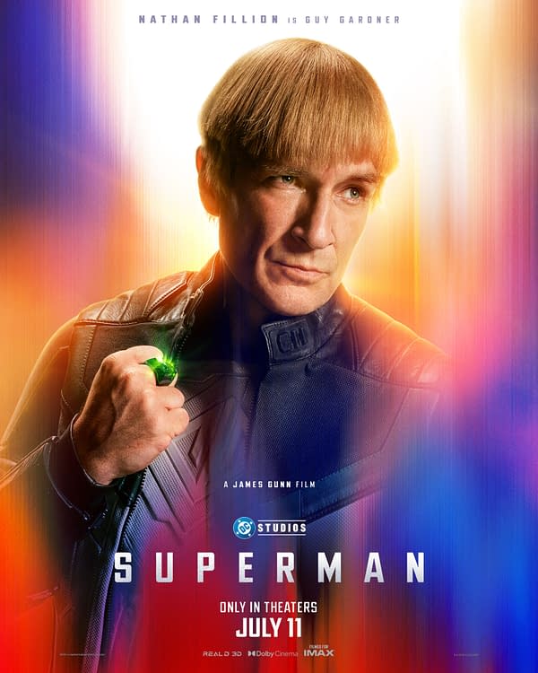 Illustration of Nathan Fillion portraying Guy Gardner, a character in the Superman universe, wearing a black leather costume and holding a glowing green object. The background features vibrant colors and text indicating the film's release date.