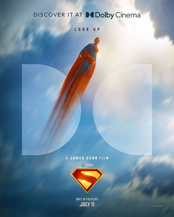 A colorful illustration featuring Superman soaring through a blue sky, with the Superman logo and promotional text for a film directed by James Gunn. The phrase 'Look Up' and 'Discover It at Dolby Cinema' are also included.