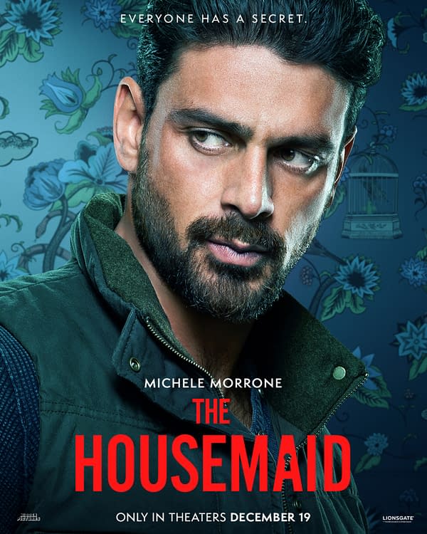 A character poster for the film 'The Housemaid' featuring a man with dark hair and a beard, looking intensely at the viewer against a decorative blue background. The text prominently displays the title 'THE HOUSEMAID' and the release date in December.