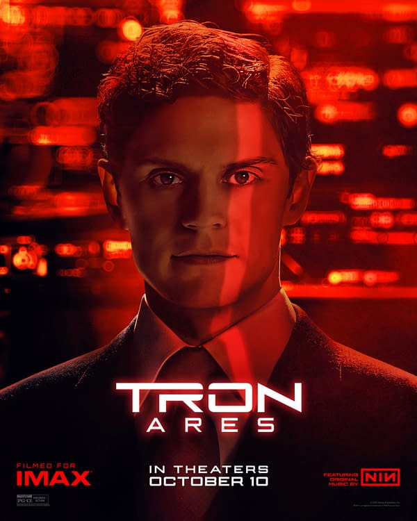 A movie poster for 'TRON: Ares' featuring a young man in a suit, his face illuminated by red light, and a digital backdrop. The poster includes the release date, 'IN THEATERS OCTOBER 10', and mentions it was filmed for IMAX.