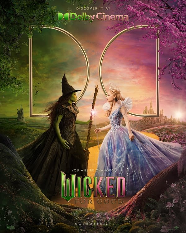 A colorful illustrative poster for 'Wicked: For Good', featuring two main characters—a green-skinned witch and a blonde princess—in dramatic poses. The design includes a vibrant landscape with blooming trees and mystical elements, promoting the film's release date of November 21.