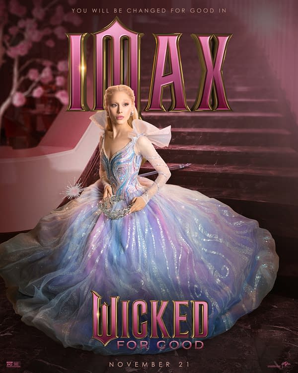 A promotional poster for the film "Wicked: For Good" featuring a character in a flowing, iridescent gown with shades of blue and pink, set against a soft-focus background with elegant architecture. The title "Wicked FOR GOOD" appears prominently at the bottom, along with the release date, November 21.