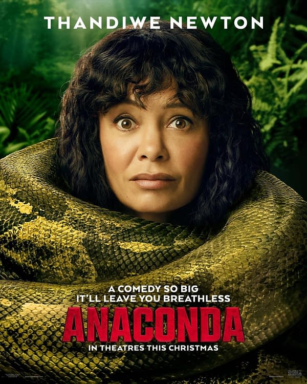 A movie poster for 'Anaconda' featuring Thandiwe Newton with a surprised expression, entwined with a large snake, surrounded by lush greenery. The poster highlights that the film is a comedy set to release in theaters this Christmas.