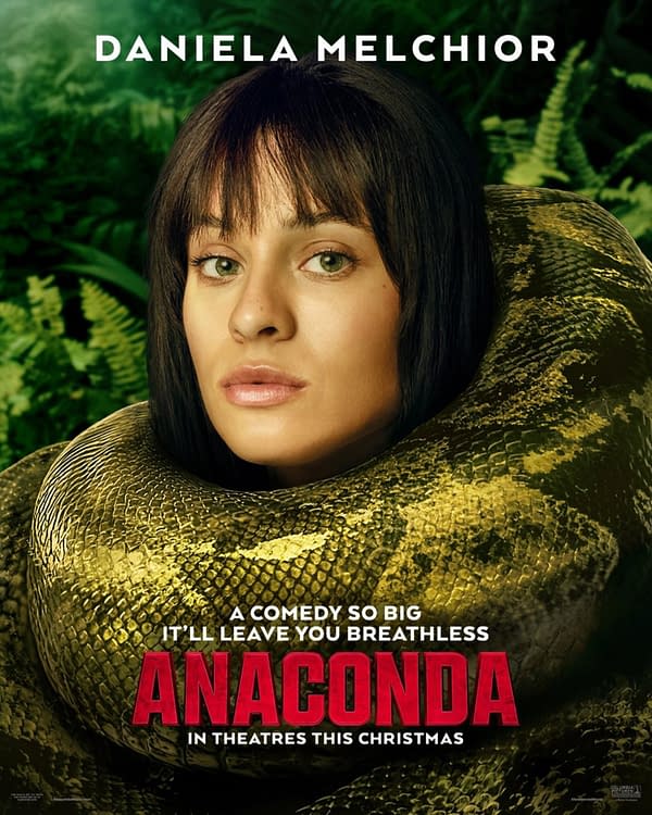 A promotional poster for the movie 'Anaconda,' featuring actress Daniela Melchior, who has a snake wrapped around her neck. The background is filled with lush greenery, and the title 'ANACONDA' is prominently displayed in bold red letters, indicating its release in theaters this Christmas.