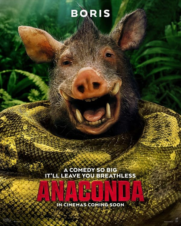 A cartoonish character named Boris, resembling a smiling wild boar with pronounced tusks, poses playfully entangled in a large, yellow and green anaconda snake. The image promotes the comedic film titled 'Anaconda,' with humorous taglines displayed.