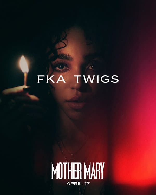 An artistic portrait of a woman holding a lit candle, featuring bold text that reads 'FKA TWIGS' above and 'MOTHER MARY' with a date 'APRIL 17' below. The image has a dark, moody atmosphere with hints of red lighting.