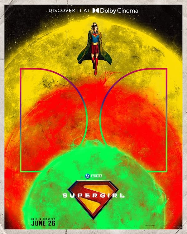 Supergirl movie poster showing the heroine flying above a glowing yellow and red background with the Supergirl logo and June 26 release date.