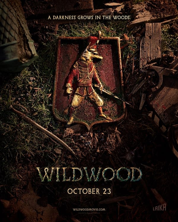 Dark fantasy Wildwood movie poster featuring a weathered shield with an animal-headed warrior in a forest of dirt, roots, and broken wood, with the tagline