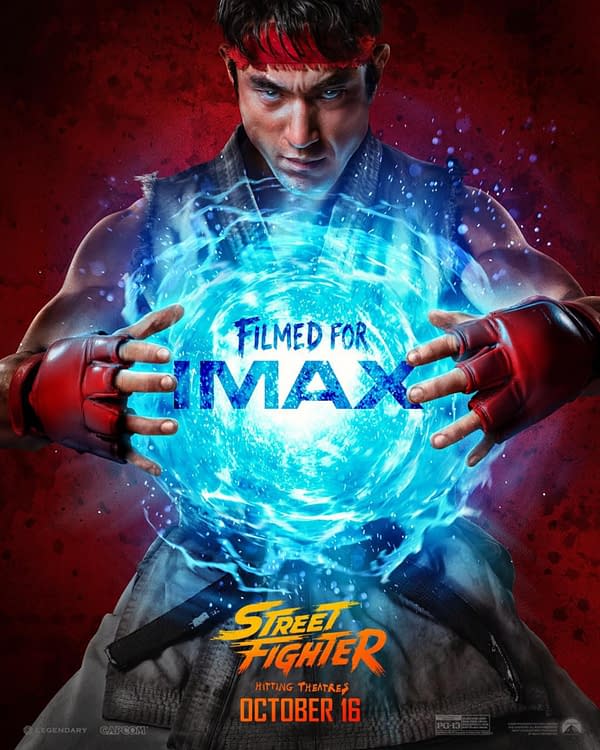 Street Fighter movie poster featuring Ryu channeling a glowing blue energy sphere, with