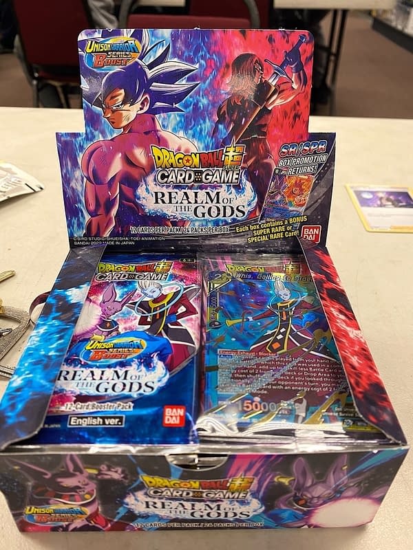 Realm of the Gods booster box. Credit: Theo Dwyer