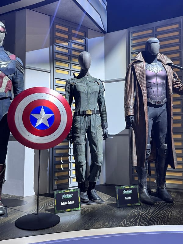 Marvel Avengers: Doomsday display at SDCC with mannequins in Black Widow, Yelena Belova, and Gambit costumes beside Captain America's shield.