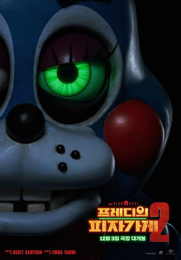 A cartoon-style character from Five Nights at Freddy's 2, featuring a blue face with large green eyes and a black nose. The bottom of the image includes promotional text for the movie.