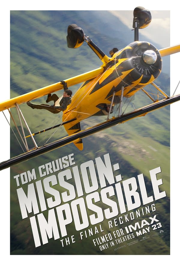 A promotional poster for 'Mission: Impossible – The Final Reckoning' featuring Tom Cruise performing an aerial stunt on a yellow and black biplane. The text highlights the film's title, release date in theaters May 23, and emphasizes it was filmed for IMAX.