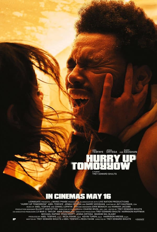 A dramatic movie poster for 'Hurry Up Tomorrow' featuring two close figures with intense expressions, set against an orange backdrop. The poster includes the film's title and release date: May 16.