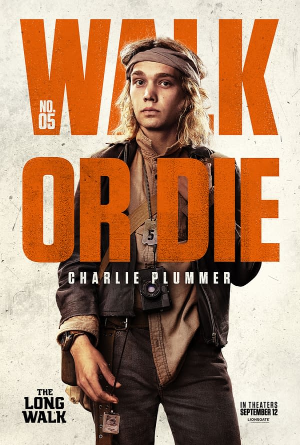 A movie poster for 'The Long Walk,' featuring a young male character, Charlie Plummer, dressed in rugged attire with a camera. The bold text reads 'WALK OR DIE' in orange, accompanied by the film's release date and production logo.