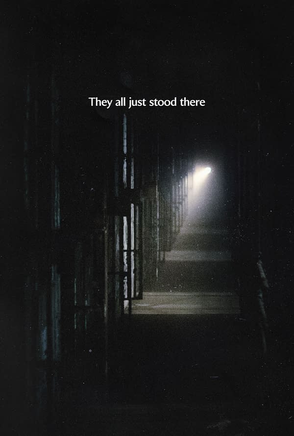 A dimly lit corridor with light casting shadows, suggesting an eerie atmosphere. The phrase "They all just stood there" is displayed prominently in the center.