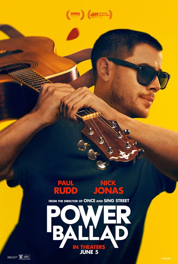 A promotional poster for the movie 'Power Ballad', featuring actors Paul Rudd and Nick Jonas. The background is bright yellow, and Nick Jonas is holding a guitar, wearing sunglasses.