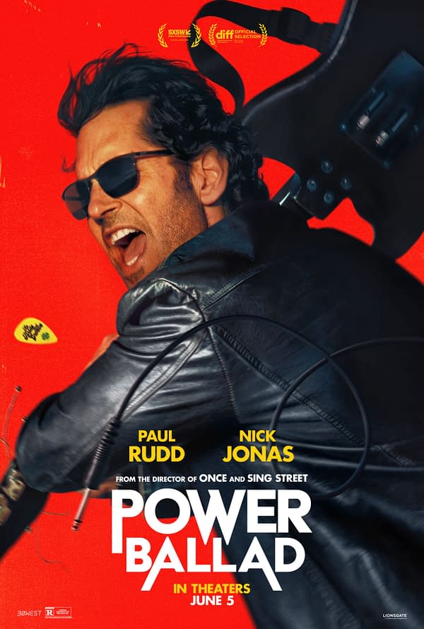 A vibrant movie poster for 'Power Ballad,' featuring Paul Rudd passionately singing with a guitar, against a bold red background. The poster highlights the film's release date of June 5 and includes accolades from film festivals.