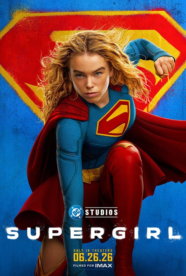 A promotional illustration for the movie 'Supergirl', featuring the character in a dynamic pose with flowing blonde curls, wearing a blue and red superhero costume adorned with a large 'S' emblem, set against a colorful backdrop of blue and red. The text below states 'DC Studios' and 'SUPERGIRL' along with the release date, June 26, 2026.