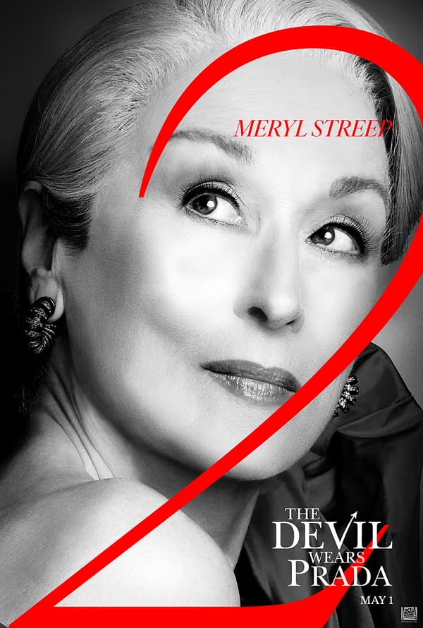 A black and white poster for 'The Devil Wears Prada 2' featuring a close-up of Meryl Streep looking thoughtfully with her hair and makeup styled elegantly. The title is displayed prominently with a bold red '2' and the film's release date, May 1.
