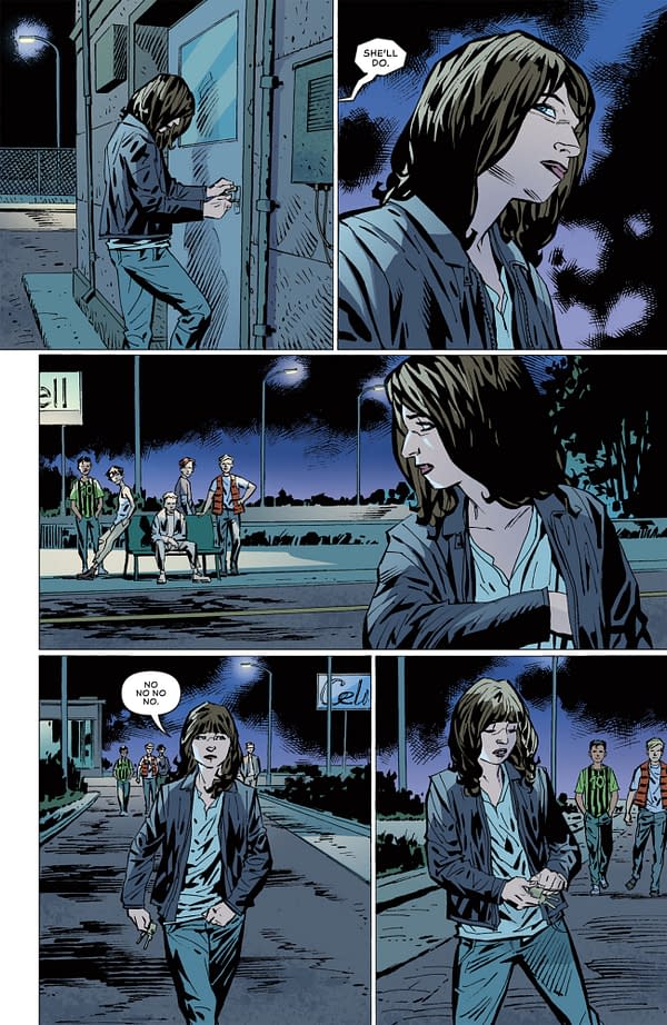 A comic panel depicts a young woman standing outside a building, looking concerned as she grips some keys. The scene features streetlights and a group of boys in the background, creating a tense atmosphere.