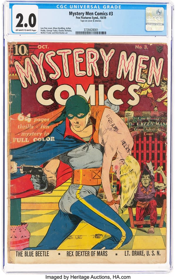 The cover of 'Mystery Men Comics #3' features a masked hero in a blue and red costume, holding a gun and rescuing a woman, while dramatic scenes unfold in the background. The comic is from Fox Features Syndicate, published in October 1939.