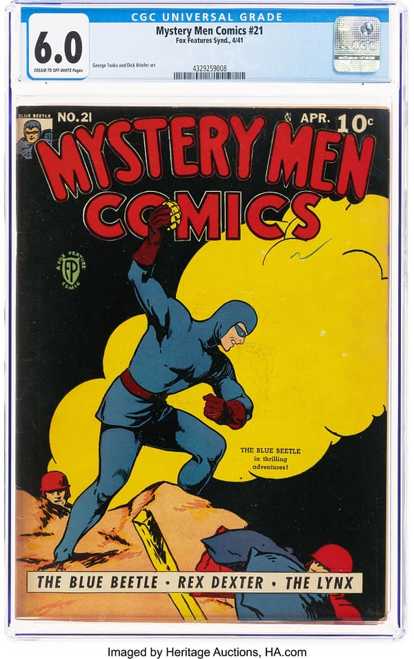 Mystery Men Comics #21 (Fox, 1941) front cover. The Blue Beetle leaps through an explosion