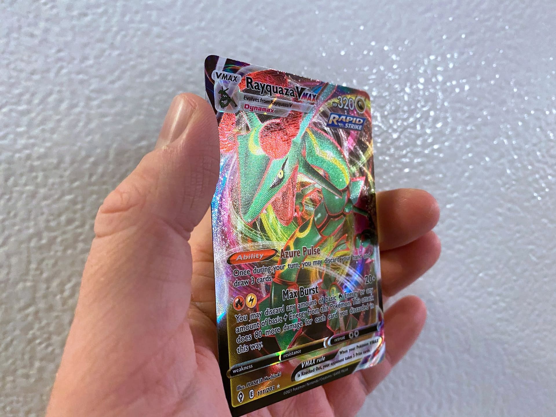 Is this anything? Rayquaza vmax black background : r/PokemonTCG