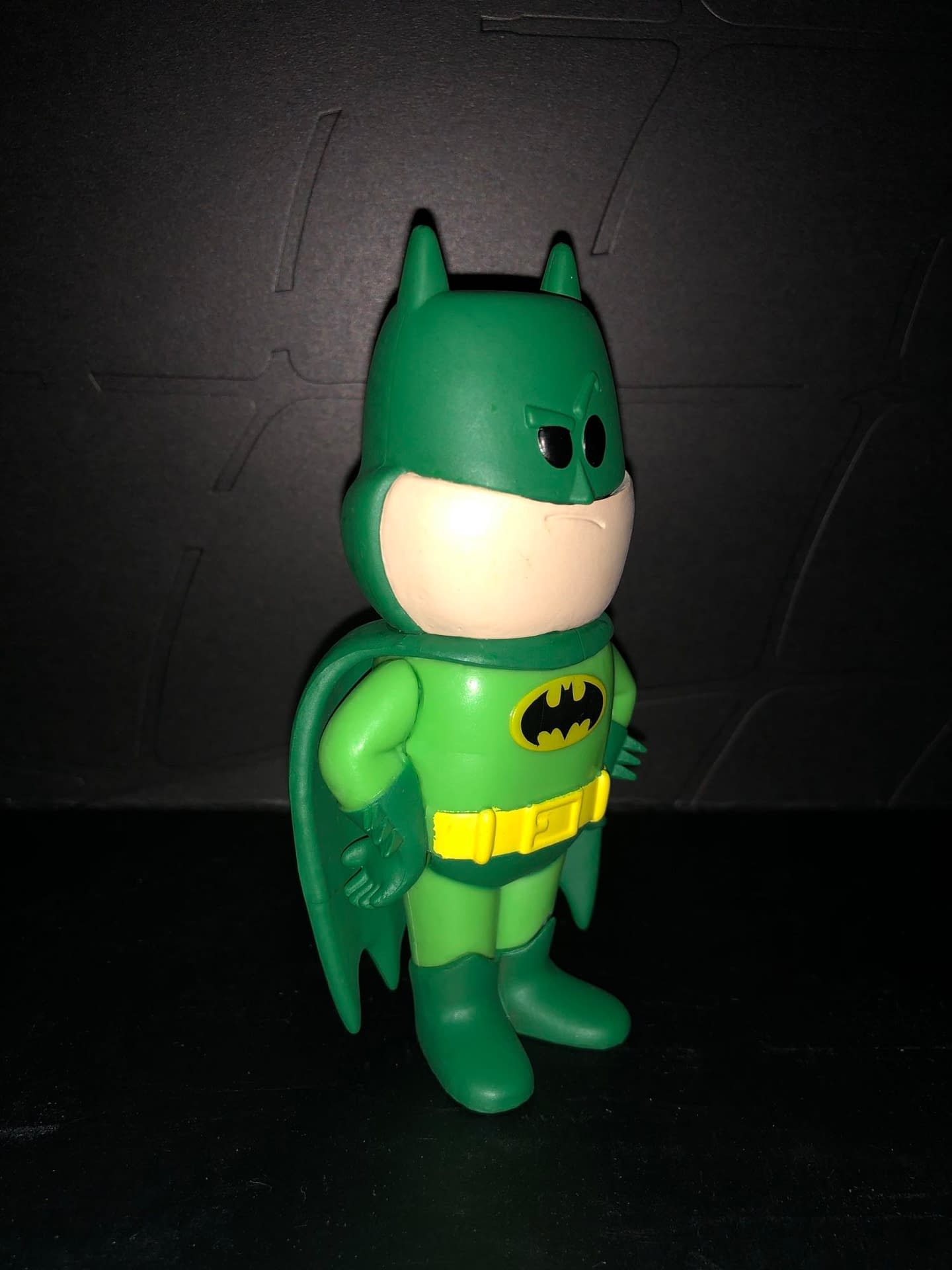 Funko Soda Vinyl Figure Emerald City Comic Con Exclusive Green Batman Figure, side view of figure.