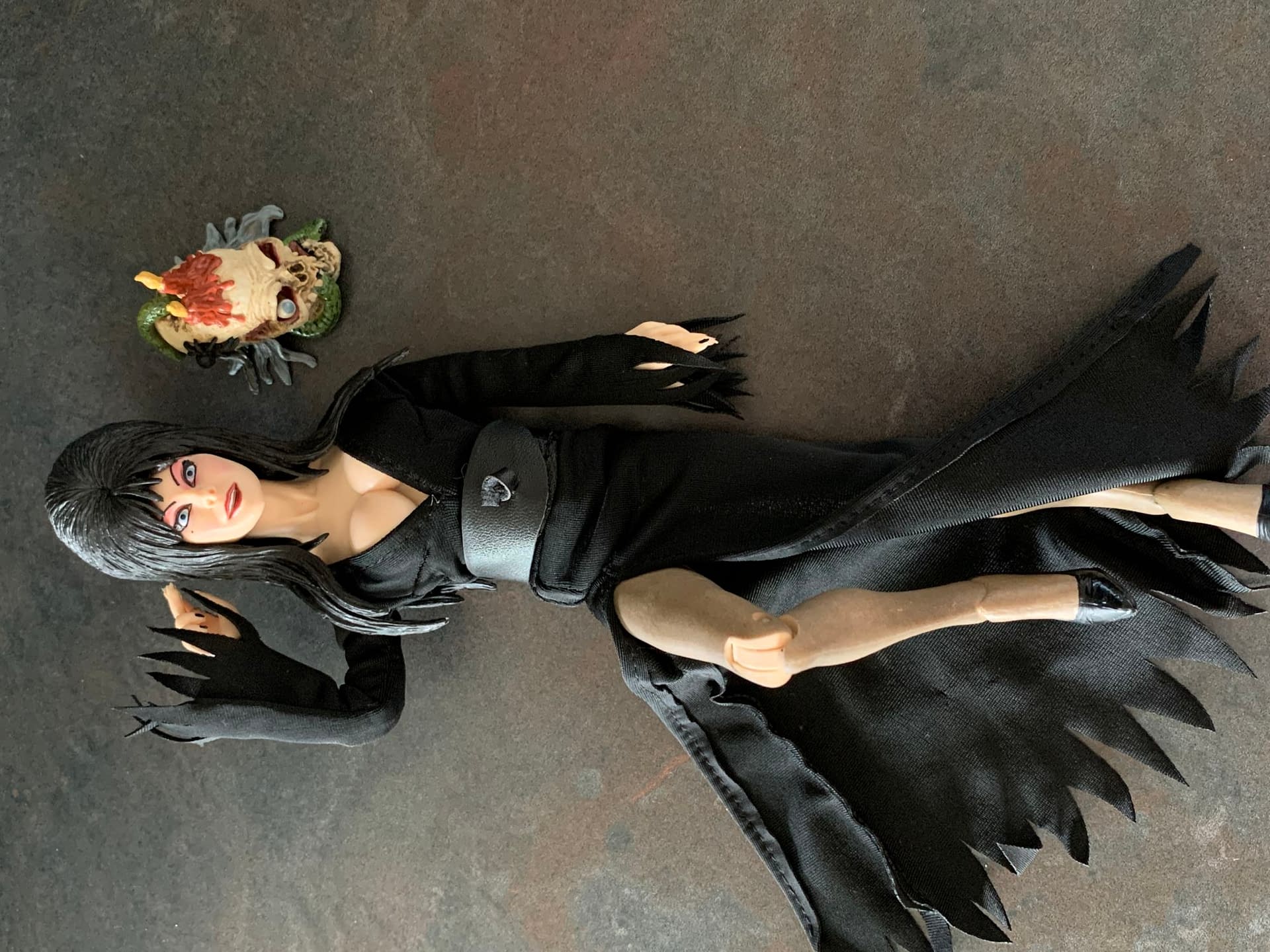 Elvira Gets The Tribute She Deserves With New NECA Figure