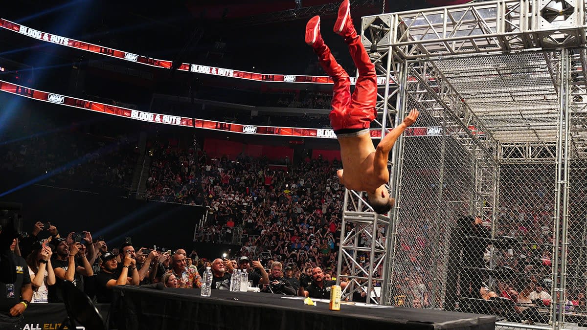 Sammy Guevara is tossed off the cage at AEW Blood and Guts