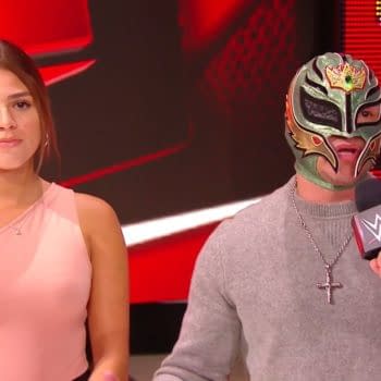 Rey Mysterio and his daughter Aalyah listen to Seth Rollins' reveal the results of a paternity test on WWE Monday Night Raw
