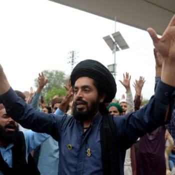 Supporters of the Tehreek-e-Labaik Pakistan (TLP) Islamist political party chant slogans as they protest against the arrest of their leader in Lahore, Pakistan April 16, 2021, photo credit: A M Syed / Shutterstock.com.