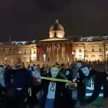 V For Vendetta-Masked Protestsors Throw Fireworks At Police In London