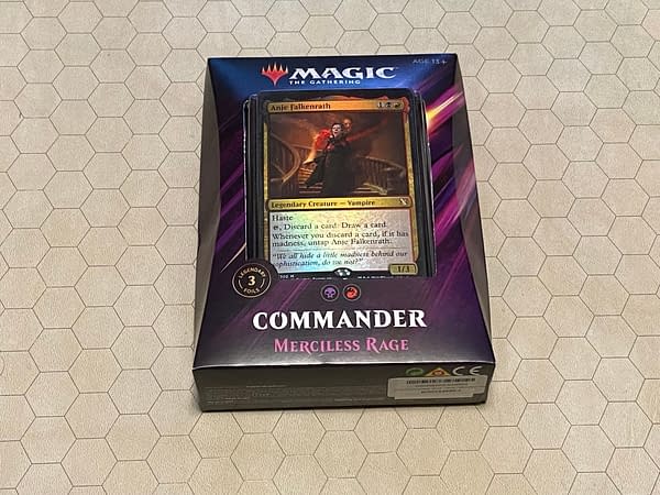 The front of the packaging for the "Merciless Rage" Commander deck from 2019, a release for the Magic: The Gathering trading card game by Wizards of the Coast.