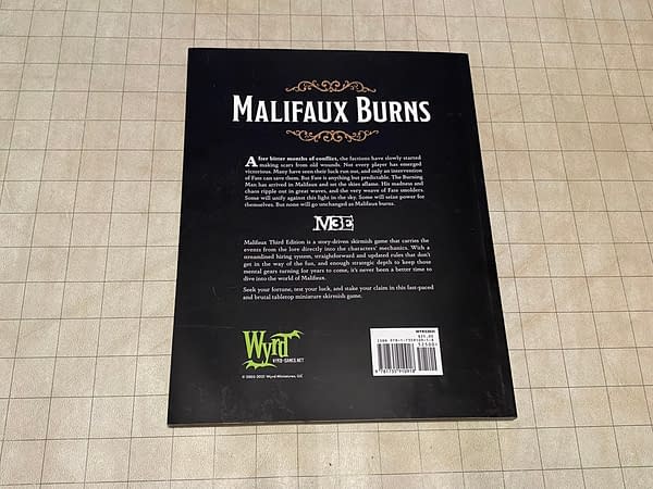 The back cover for Malifaux Burns, a supplemental book for the tabletop skirmish wargame Malifaux by Wyrd Games.