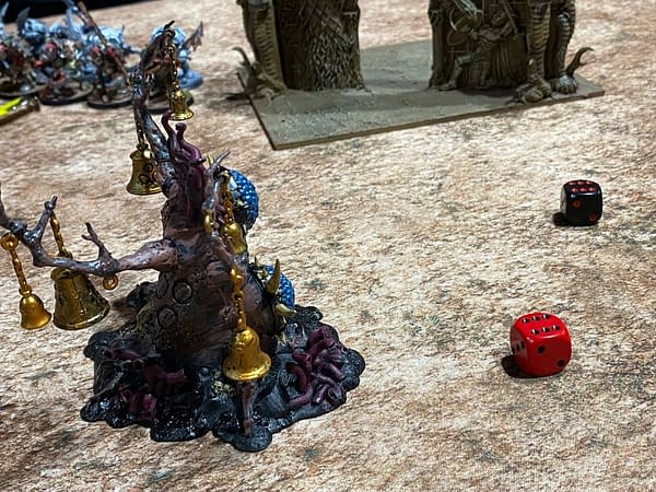 A very unlikely charge roll, achieved by Ryan's Brutes. Photo credit: Josh Nelson, for a Path to Glory campaign for Age of Sigmar, a fantasy wargame by Games Workshop.